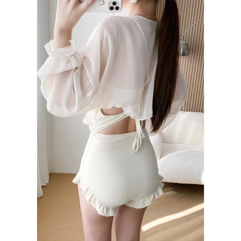 2023 New Summer Elegant V-Neck Spliced Wood Ear Edge Lace Hollow Back Strap Small Shirt Sun Protection Bikini Two Piece Set