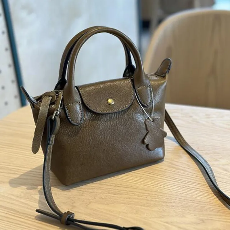 2025 Spring/Summer vegetable tanned cow leather women's Bag Hand Bill Shoulder Bag Leather casual fashion mini crossbody bag