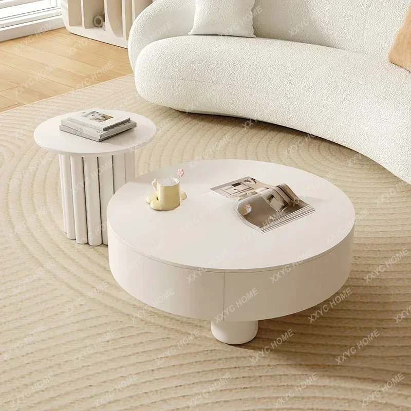 

A French cream style coffee table modern simple living room round rock slab coffee table