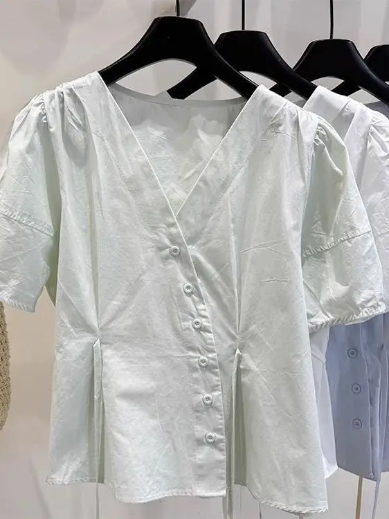 Afslankende kleur Asymmetrische knop V-Ne Summer irt Dames Faion Bubble Sve Top Koreaanse Sle Loose Fit ort S...