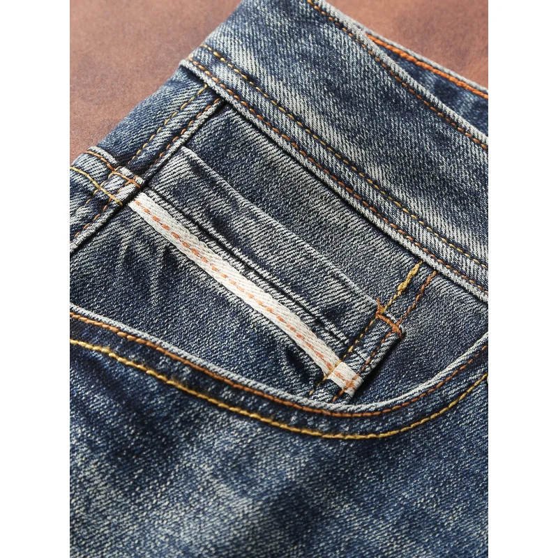 Jeans da uomo in stile europeo e americano retrò, bianco lucido, elastico, vestibilità slim, abbigliamento da uomo moda autunnale