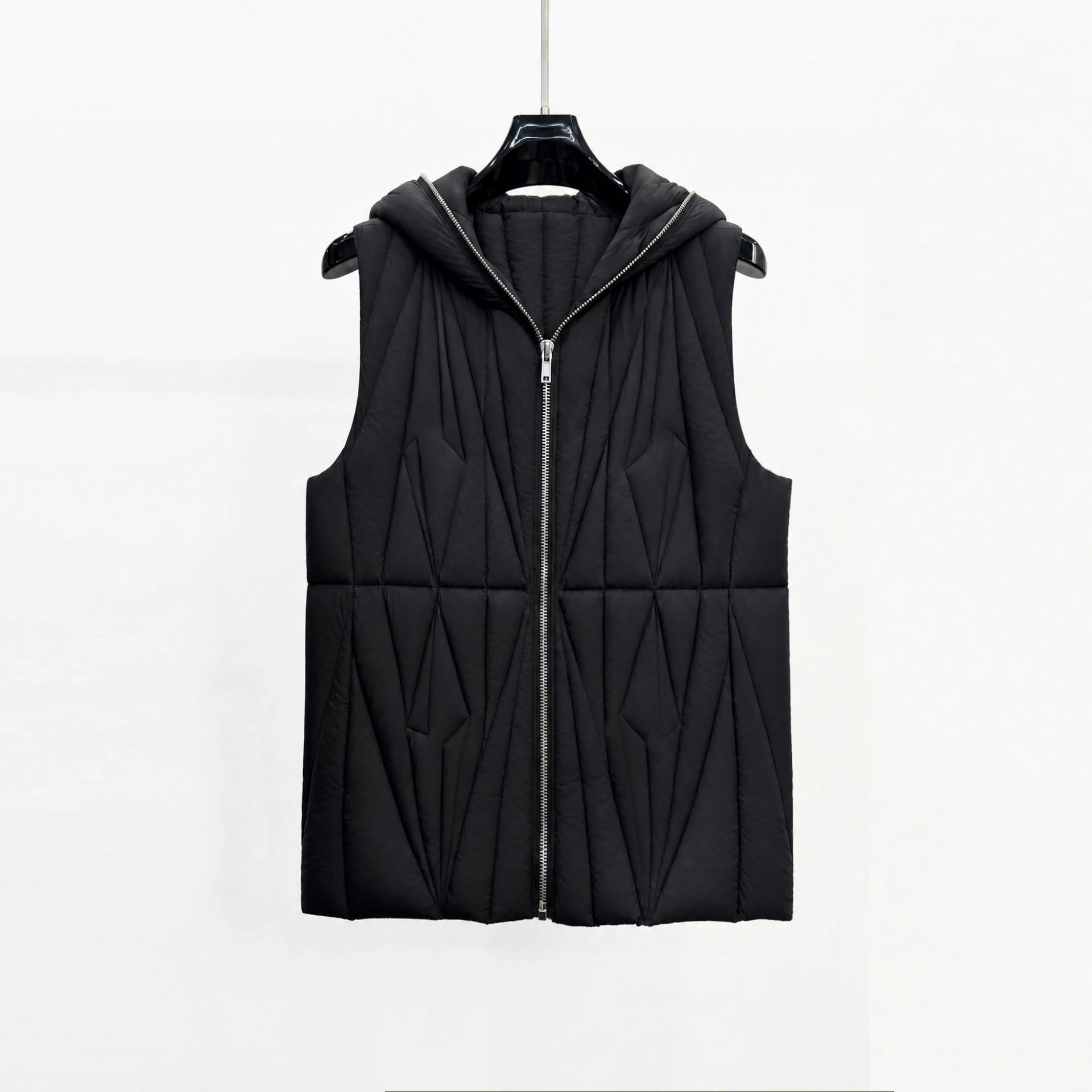 Minimalist, stylish, and warm hooded down vest—new-for-winter 2026 goose-down-filled outerwear for men and women.
