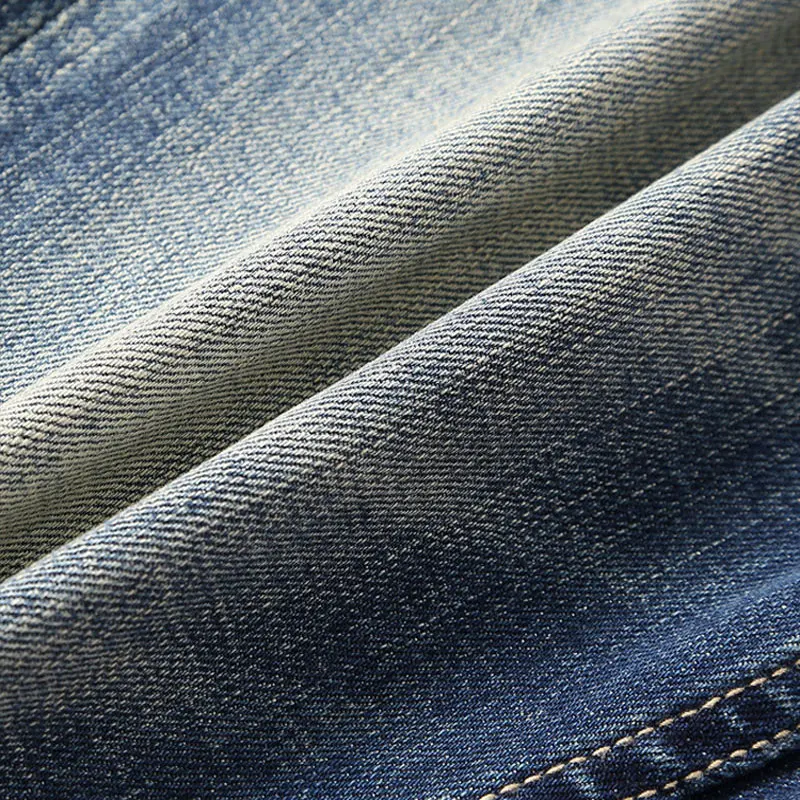 Jeans da uomo Vintage di nuova moda di alta qualità retrò lavato blu Stretch Slim Fit Jeans strappati da uomo ricami pantaloni in Denim firmati