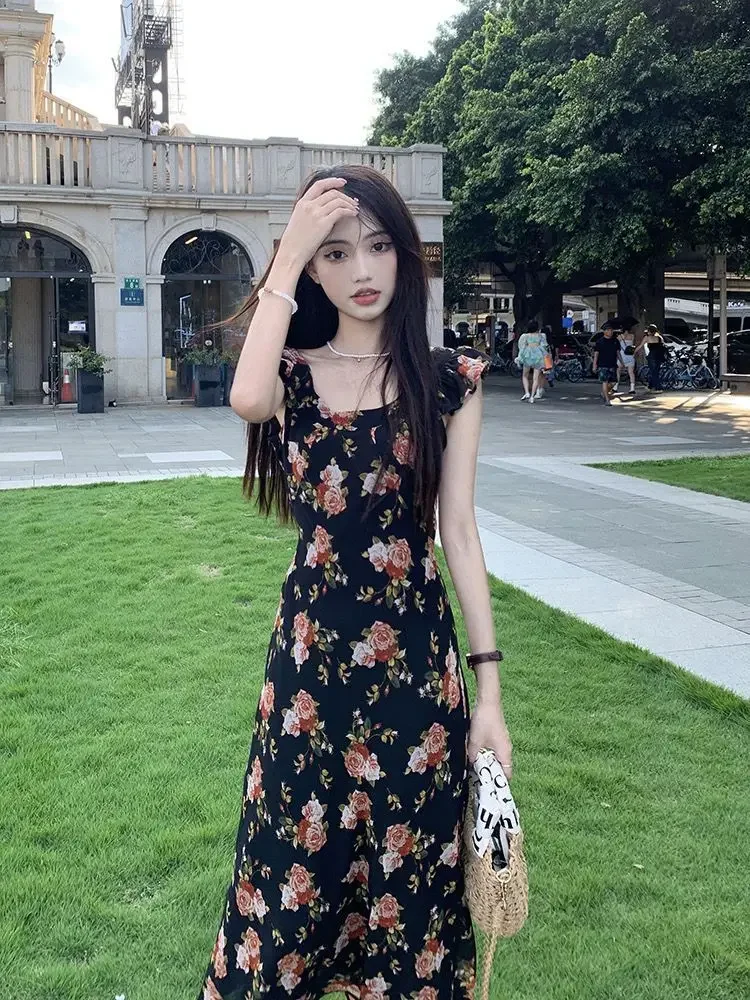 Abito femminile con fasciatura aperta sul retro Abito floreale midi da donna Fiore senza schienale Nero Moda Estate 2025 Abiti curvy Festa elegante