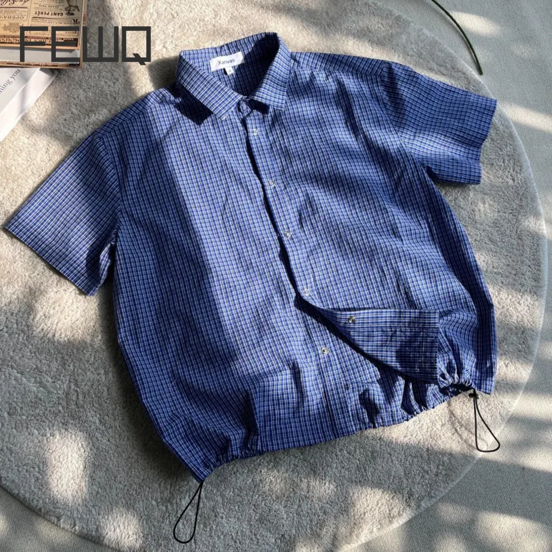 FEWQ, nueva camisa de verano para hombre, cuello vuelto, diseño a cuadros, contraste de Color, cordón, un solo pecho, manga corta, Tops para hombre 24K4570