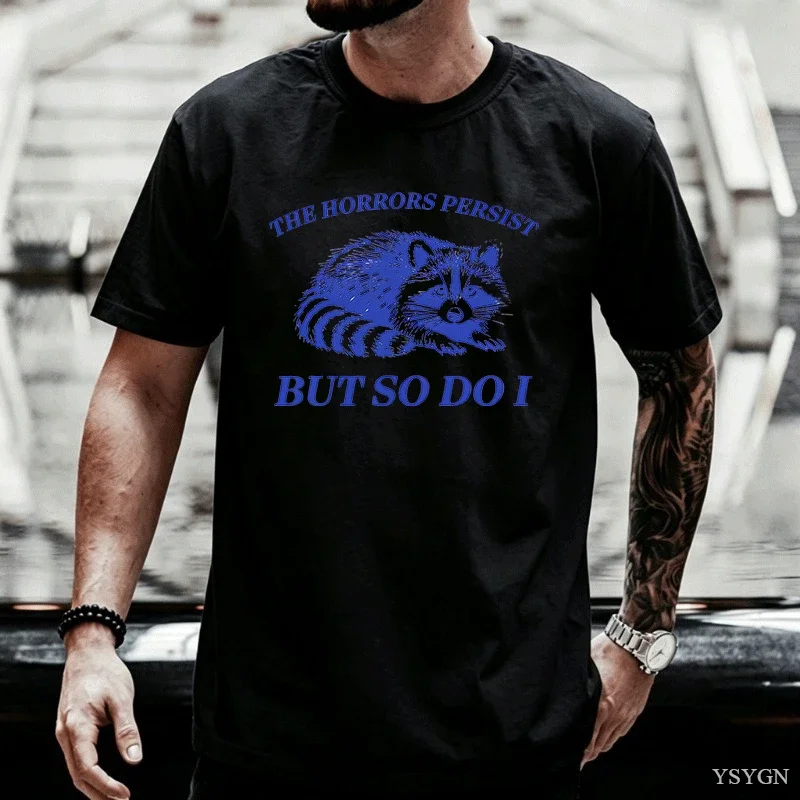 The Horrors Persist But So I T-Shirt Men Women Funny Raccoon T Shirt Vintage Y2K Animal Humor Tshirt Short Sve Tee 2026 New Mode
