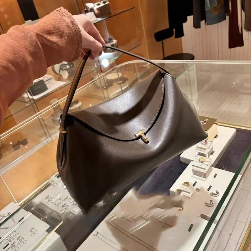 

2025 новая модная легкая роскошная нишевая сумка через плечо из воловьей кожи большой вместимости, высококачественная сумка через плечо