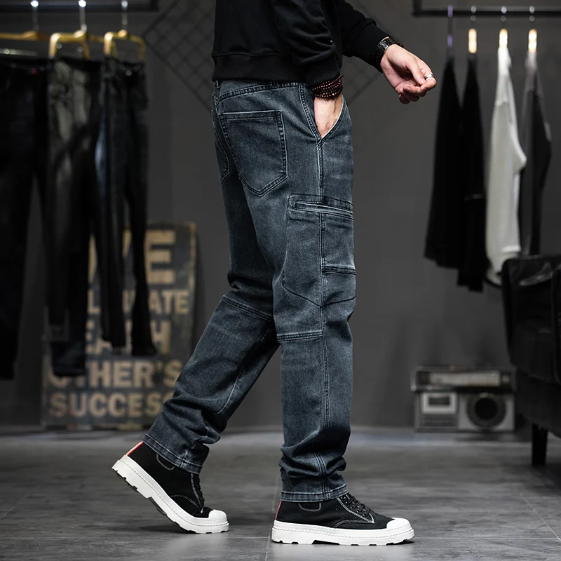 Novos modelos de outono e inverno jeans de trabalho emendados masculinos moda multi-bolso jeans soltos calças masculinas tamanho grande 28-44