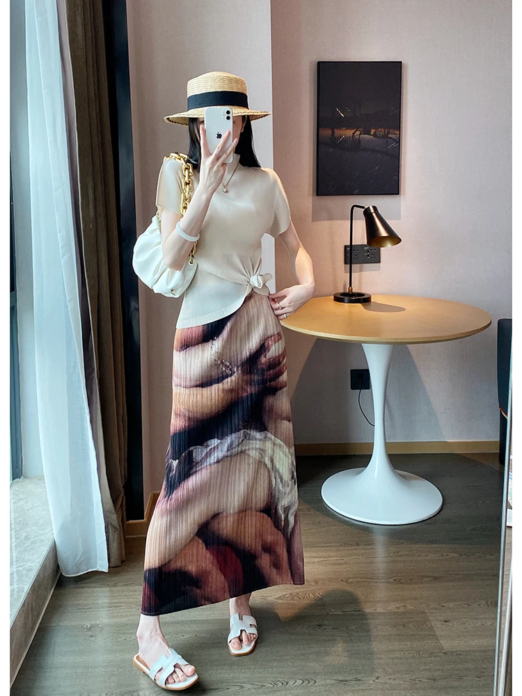 Vrouwen bedrukte halve rok 2025, zomer nieuwe hoge taille, casual losse grote maat stretch casual mode vrouwelijke halve rok