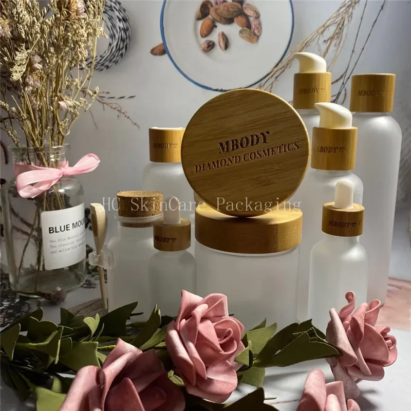 

Custom Logo matte clear shampoo pump bamboo lid skin care container eco friendly cosmetic packaging Amber PlasticShampooBottles