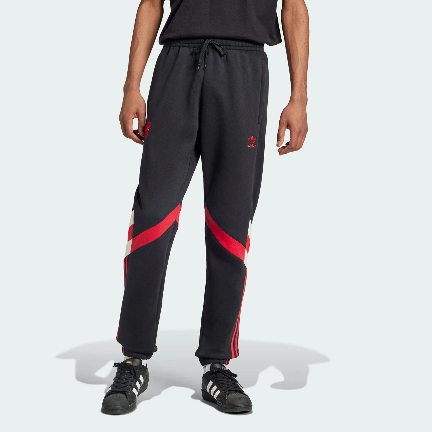 

Adidas genuine Three Stripes Men's Football Casual Joggers IS6520