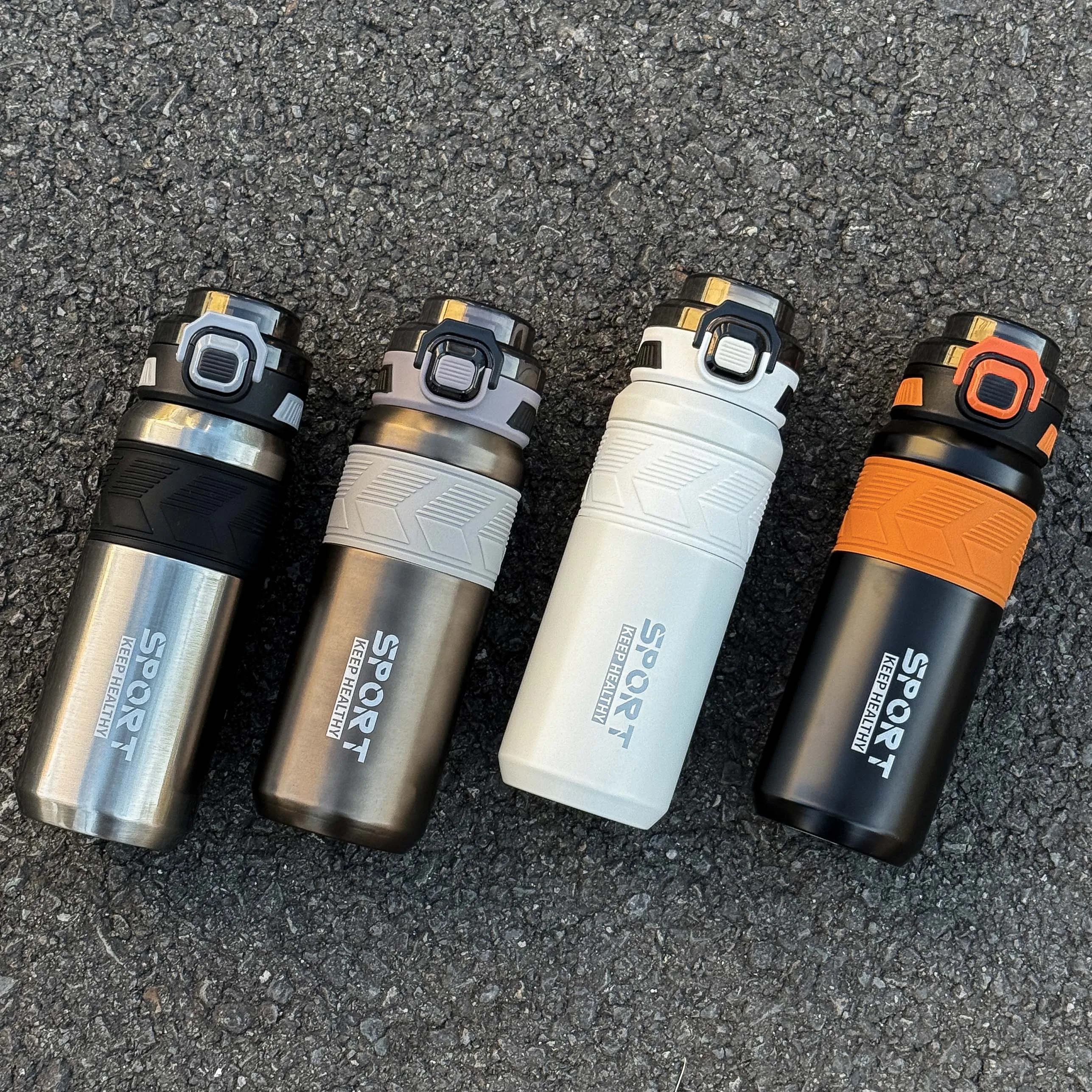 قطعة واحدة من كوب ترمس من الفولاذ المقاوم للصدأ عصري سعة 650 مل، زجاجة مياه حرارية عصرية مزدوجة الشرب، محمولة بمقبض للخارج