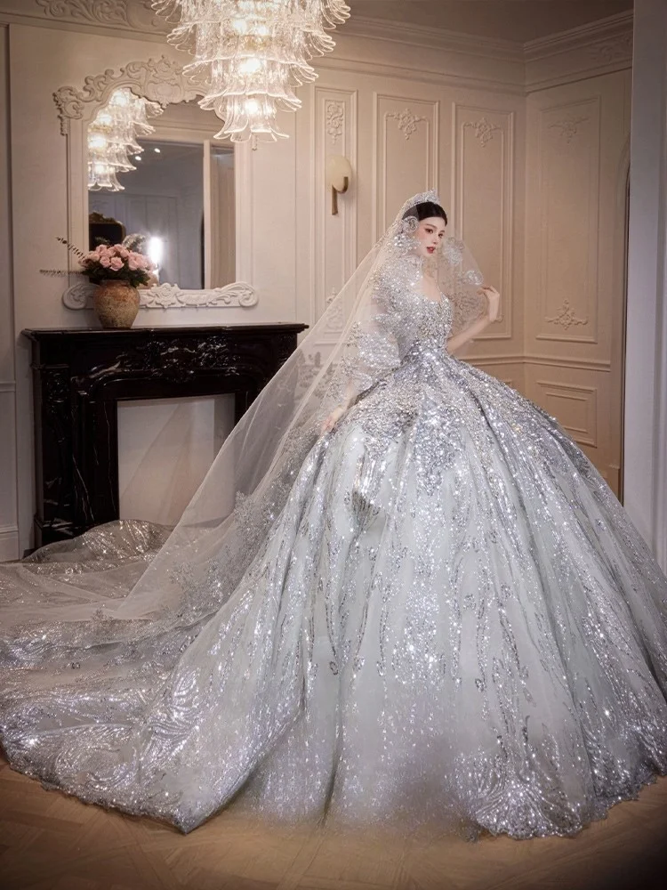 

A new heavy-duty luxurious one-shoulder dress with large tailline