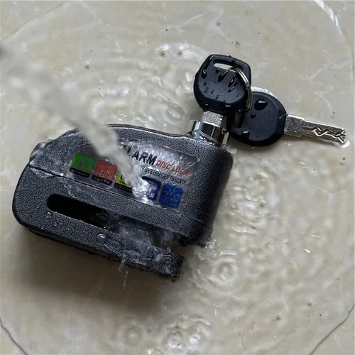 Imagen 2 del producto Cerradura de alarma para motocicleta y bicicleta, candados de freno de disco de seguridad antirrobo para bicicleta y patinete, candado de rueda de cuerda con recordatorio de advertencia fuerte de 110dB