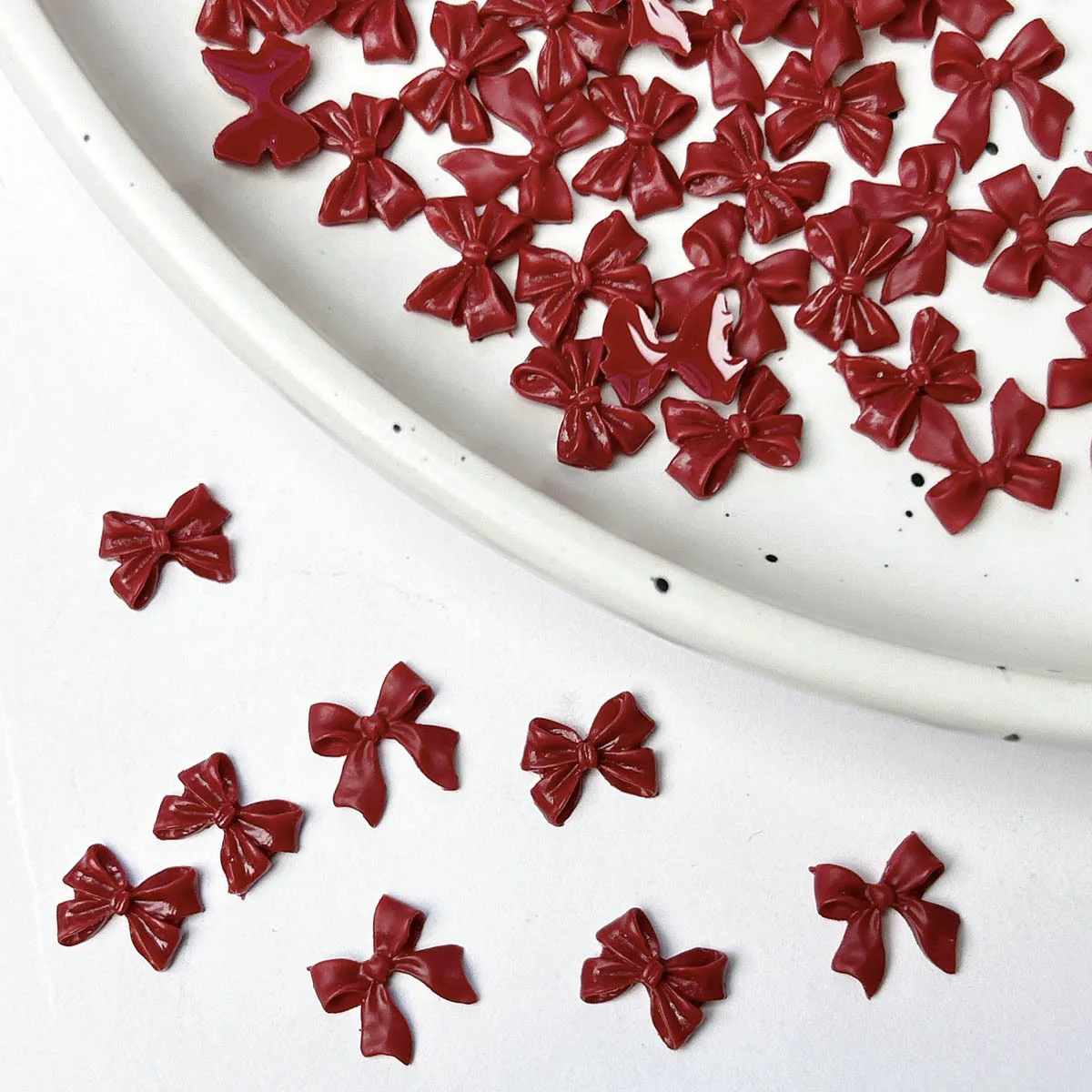 50 pçs borgonha 3d acrílico arco arte do prego encantos vinho vermelho bowknot acessórios para manicure decoração unhas suprimentos material