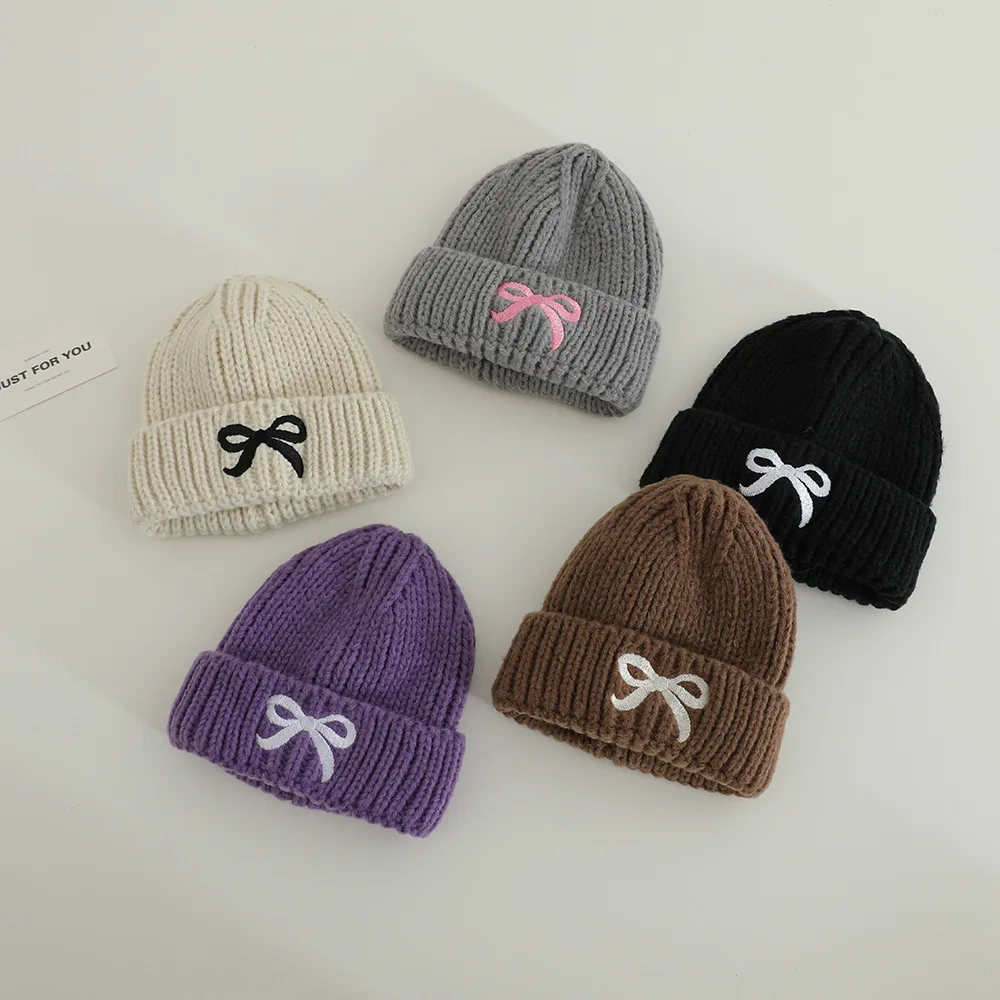 الأطفال محبوك قبعة لينة دافئة 48-52 سنتيمتر الخريف الشتاء الفتيات الفتيان يندبروف القبعات مع القوس طفل الباردة برهان قبعة الاطفال رشاقته قبعات