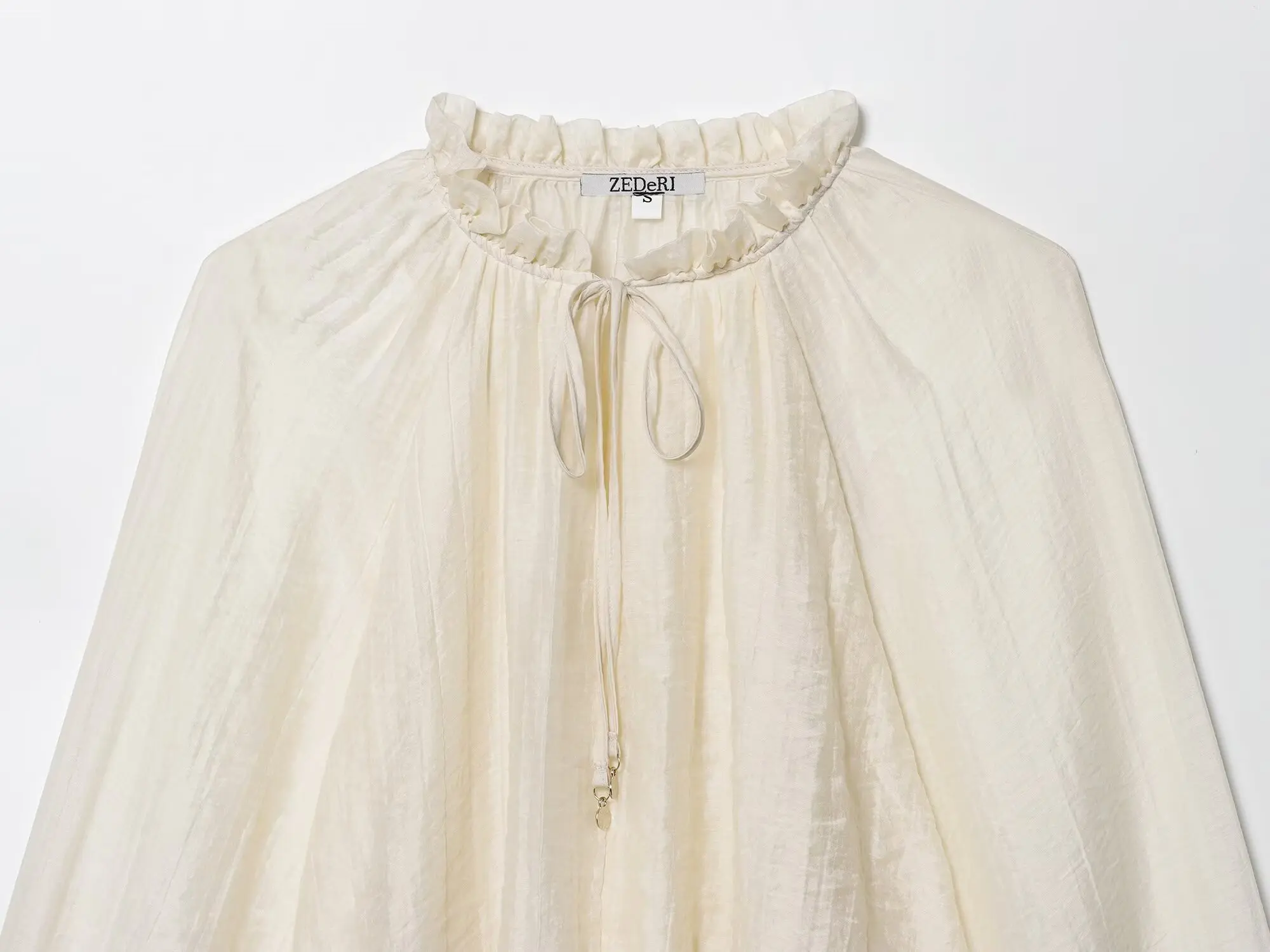 2025 moda de otoño para mujer, blusa semitransparente drapeada con mangas abullonadas, camisa holgada de tela Tencel minimalista elegante para mujer