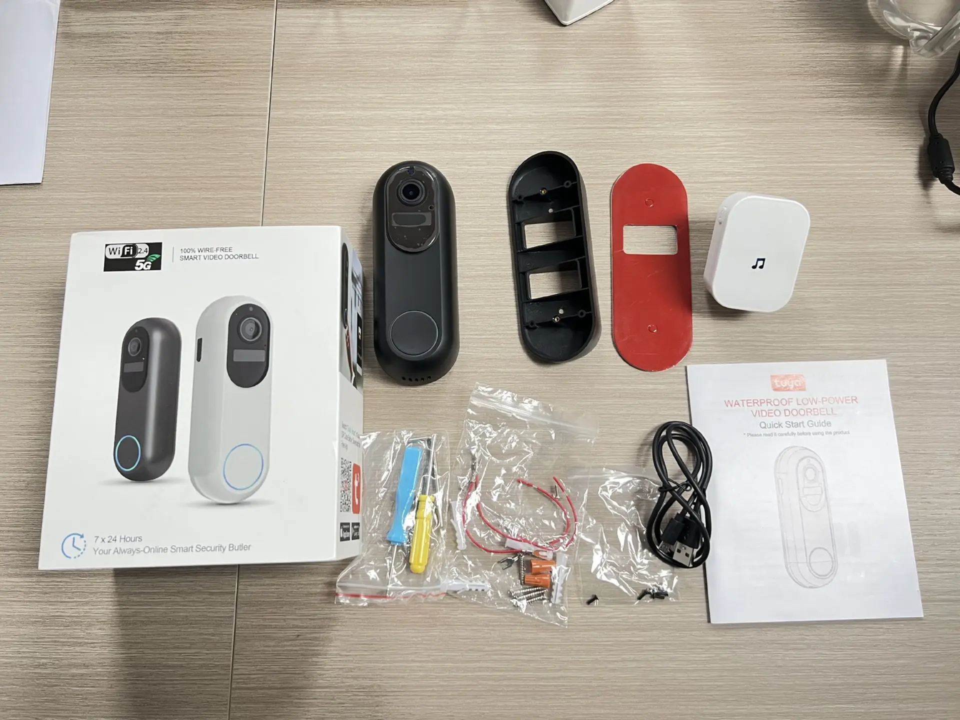 Black cylindrical wireless video doorbell camera 1080p dual wifi with circular camera lens and touch-sensitive button.