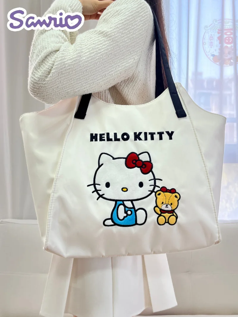 

Sanrio Co Branded Kuromi Handbag Hellokitty Melody One Shoulder Handheld Laser Nylon Large Capacity Commuter Tote Bag