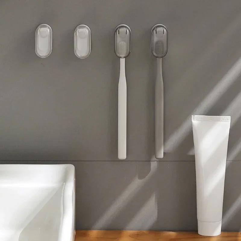 Nuevo soporte para cepillos de dientes sin polvo, innovador esencial para el hogar, soporte para cepillos de dientes a prueba de polvo, diseño elegante, característica montada en la pared