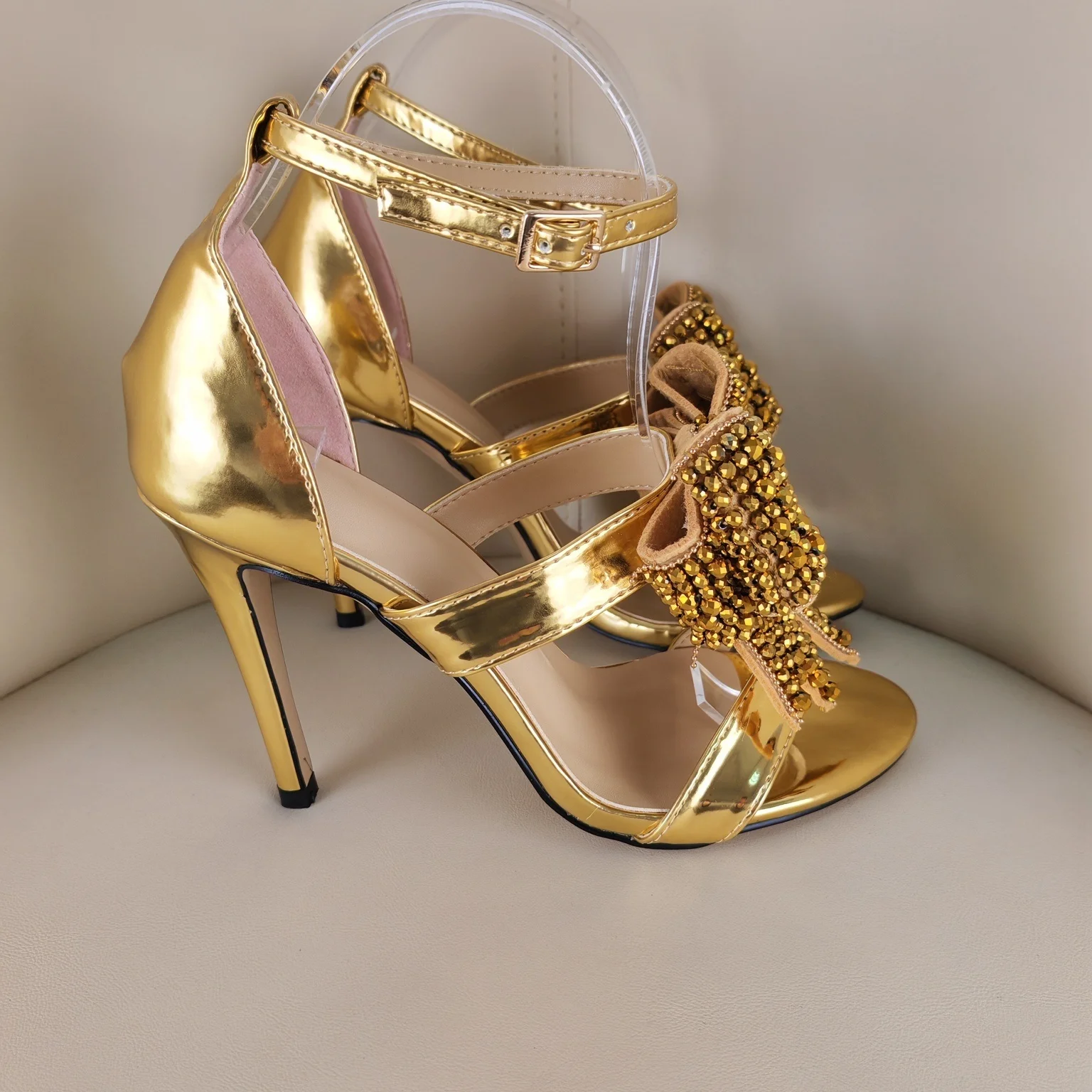 Women's Gold Metallic Stiletto Sandals Beaded Bow Detail Ankle Strap Glam Luxe Style for Evening Events Forward Party Looks