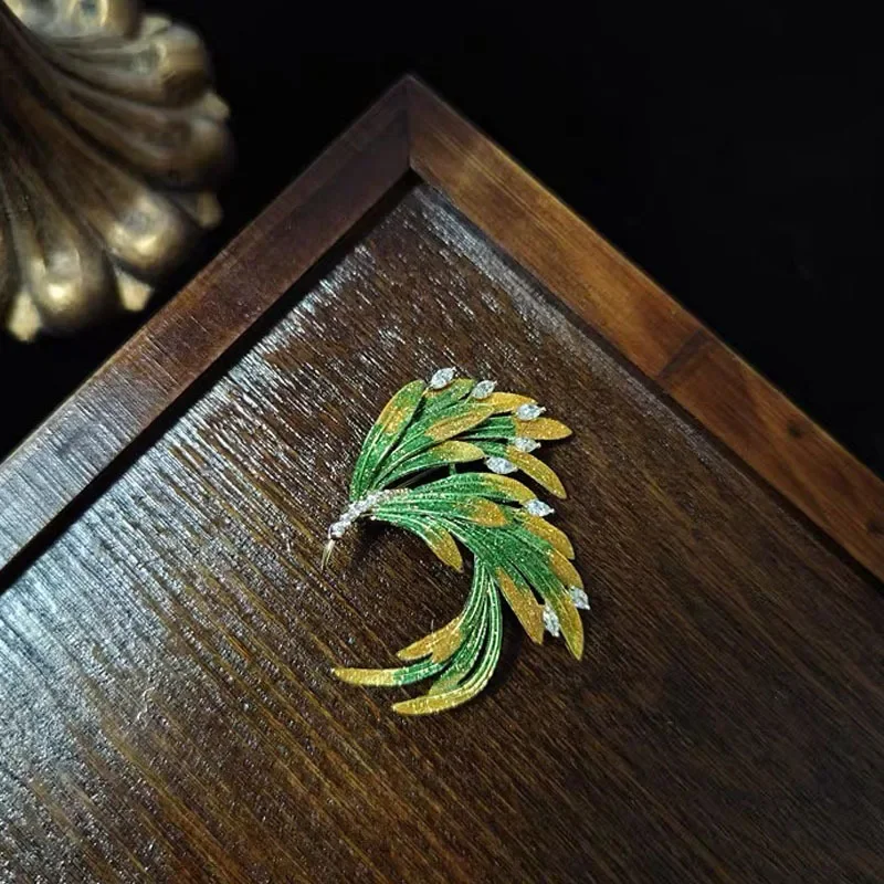 

A woman with a grand, elegant, fashionable and high-end brooch paired with a unique vintage silk scarf buckle accessory