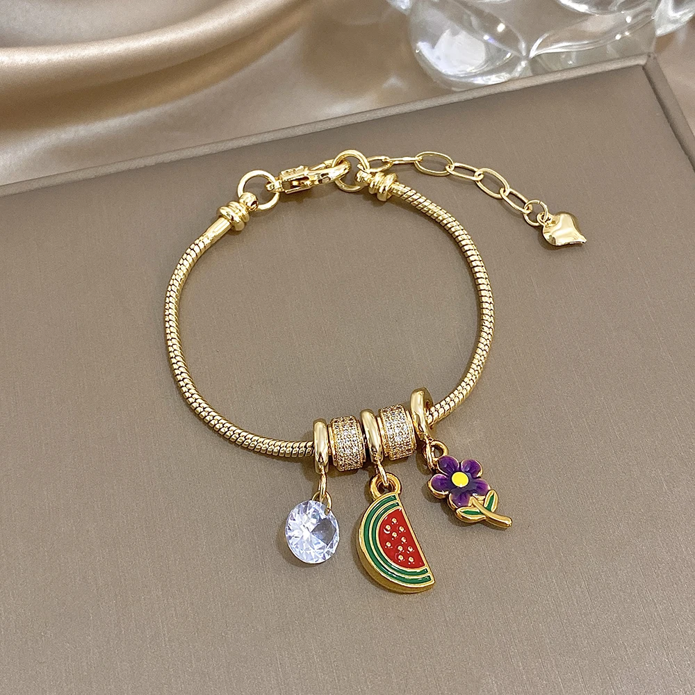 

Freetry Exquisite Zircon Stainless Steel Snake Bone Chain Bracelet for Women Boho Starfish Conch Imitation Pearl Pendant Bangle