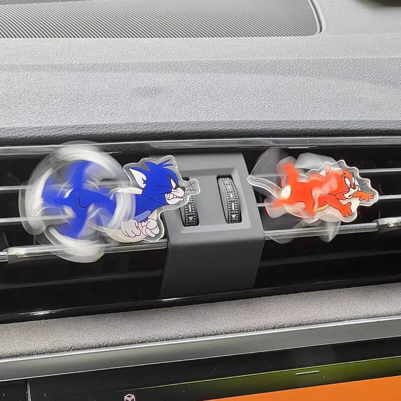 Tom y Jerry dibujos animados coche salida de aire decoración aire acondicionado accesorios acrílicos Clip juguetes giratorios Kawali regalo para niños