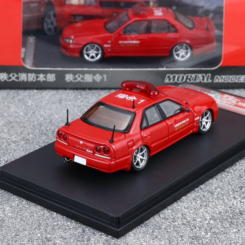 Nuevas existencias Mortal 1:64 Er34 Skyline 25gt versión motor de bomberos coche de policía simulación aleación fundida modelo en miniatura juguete para regalo personalizado