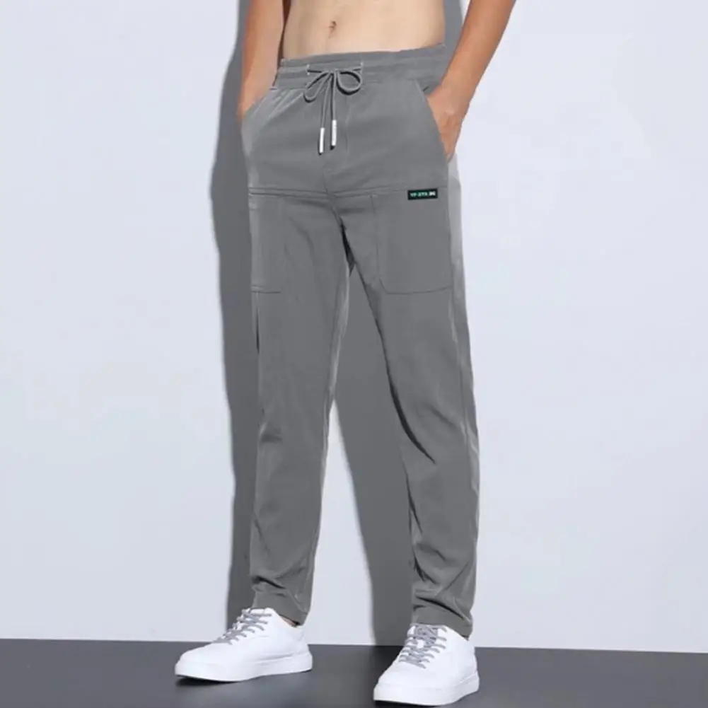 Homens sweatpants cordão multi bolsos verão cor sólida meados de cintura solta respirável perna reta calças masculinas streetwear