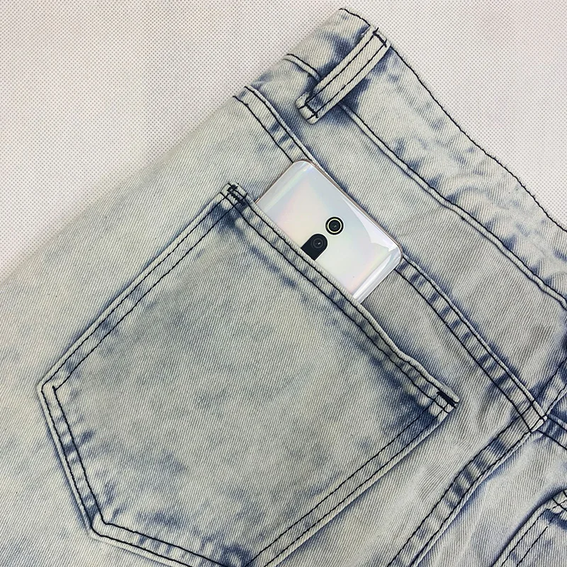 Celana jeans pria musim panas model longgar 2025, desain trendi gaya jalanan, celana lurus musim gugur, celana robek gaya motor untuk pria