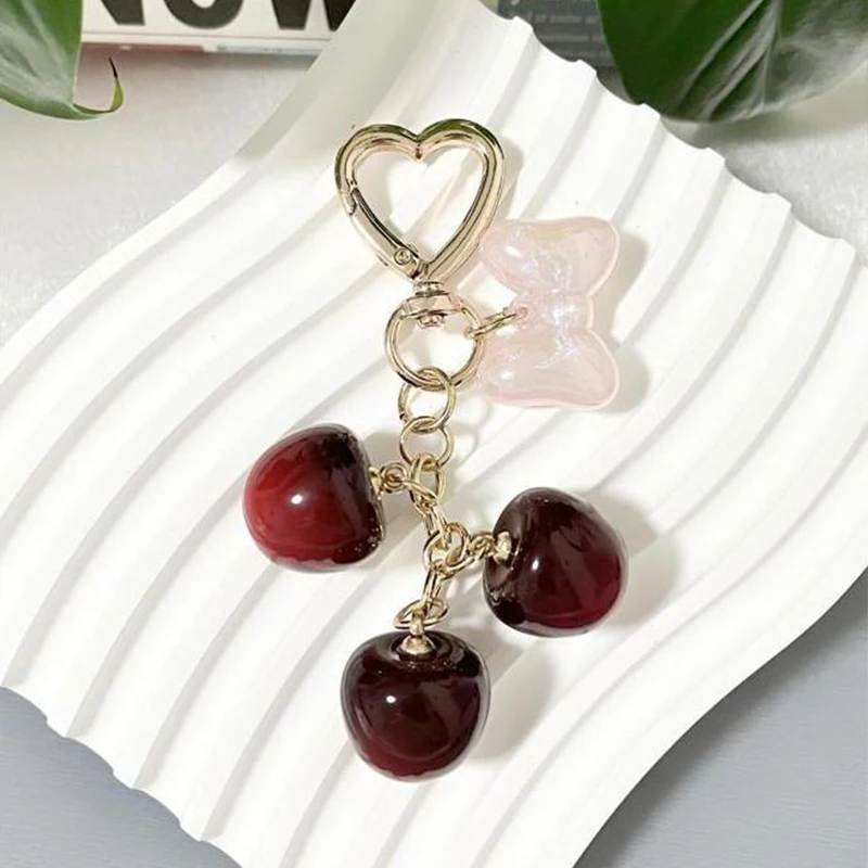 

Новый брелок с бантом и вишневой сумкой, подвеска, брендовый дизайн, милое изысканное украшение для сумки, подвеска с красной вишней, креативный подарок для женщин 2025