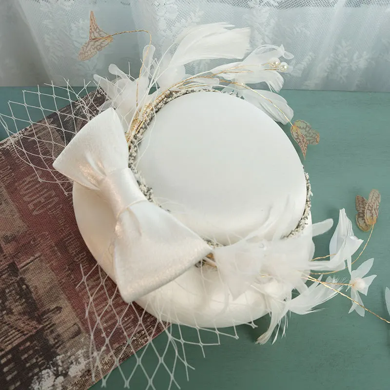 Spring and summer new style French bow feather-decorated small Top hat elegant party Wedding Bride Wedding Fascinator Caps woman