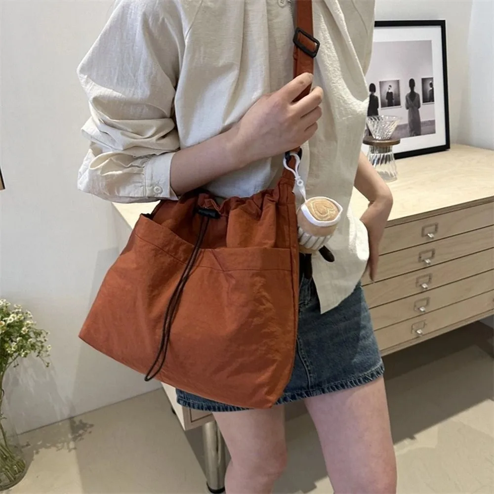 

Sweet Korean Style Drawstring Bucket Bag Large Capacity Crossbody Bag Nylon Shoulder Bag Solid Color Tote Bag Girls