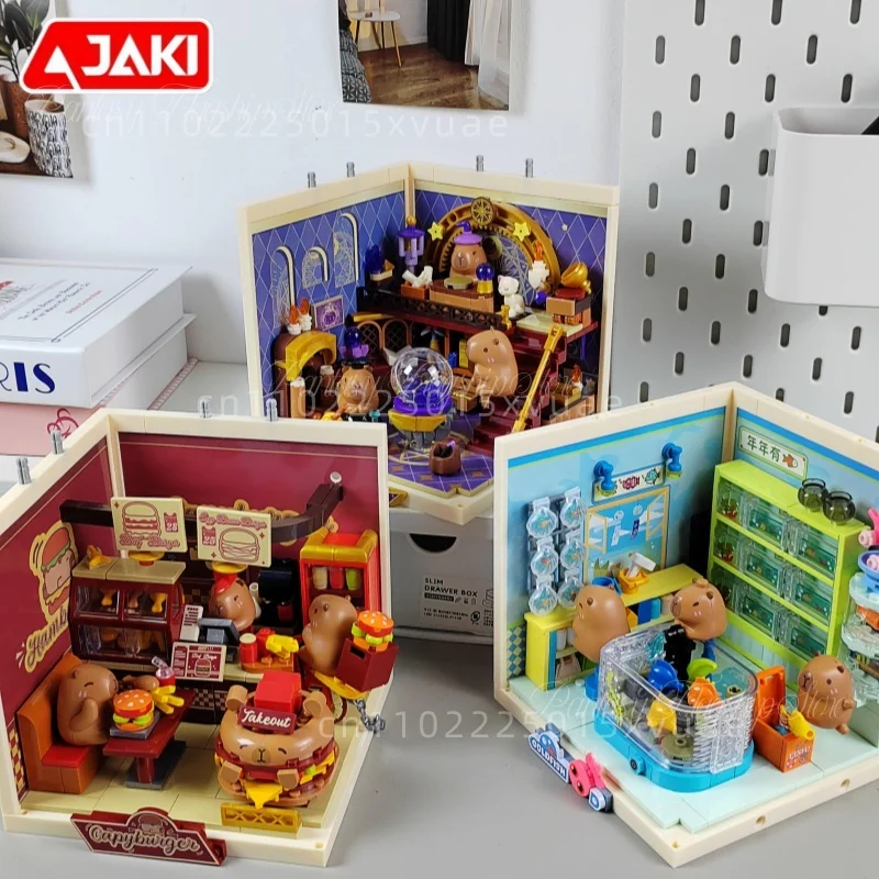 

JAKI Capibala Building Blocks Super Town Small Particle Assembly Cartoon Street Scene Toy Models Ornament Children Birthday Gift