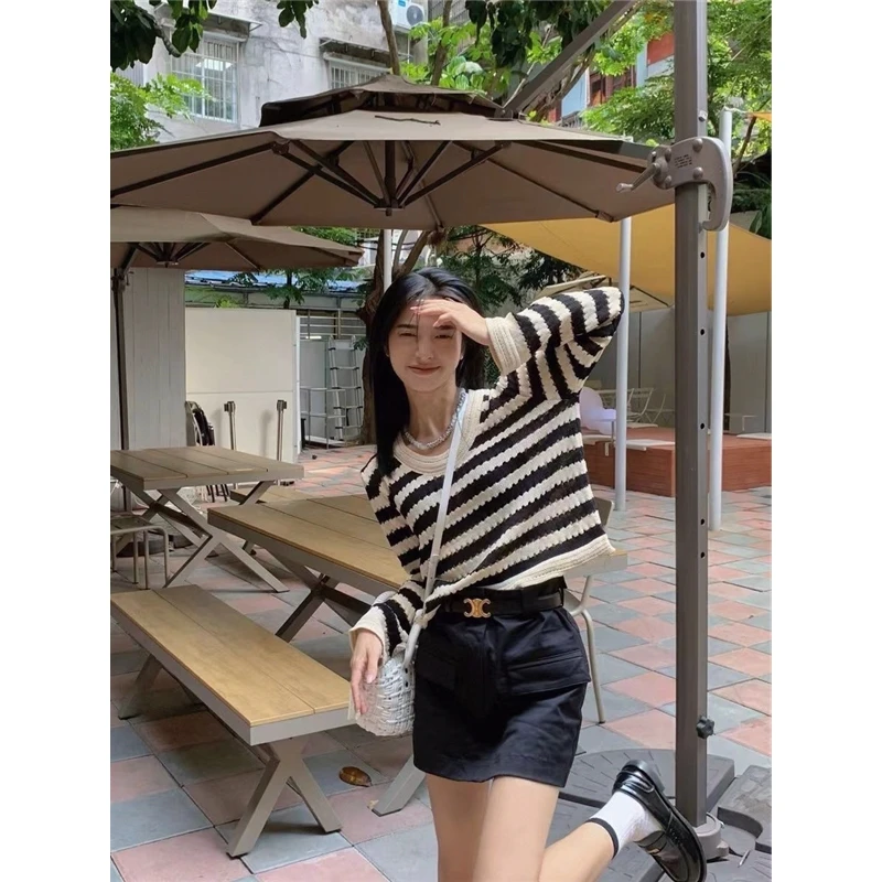 デザインセンセーション レトロストライプニットウェア 透かし彫り ルーズ ラジースタイルトップ 春秋新作 レディースプレミアムセーター