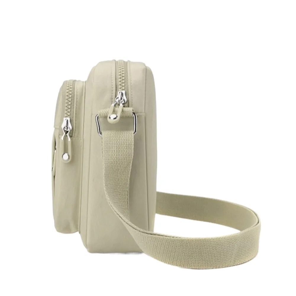 Casual Solid Color Nylon Shoulder Bag Multi-layer Lightweight Middle Aged Tote Bag Korean Style Multi Pocket Phone Bag Women