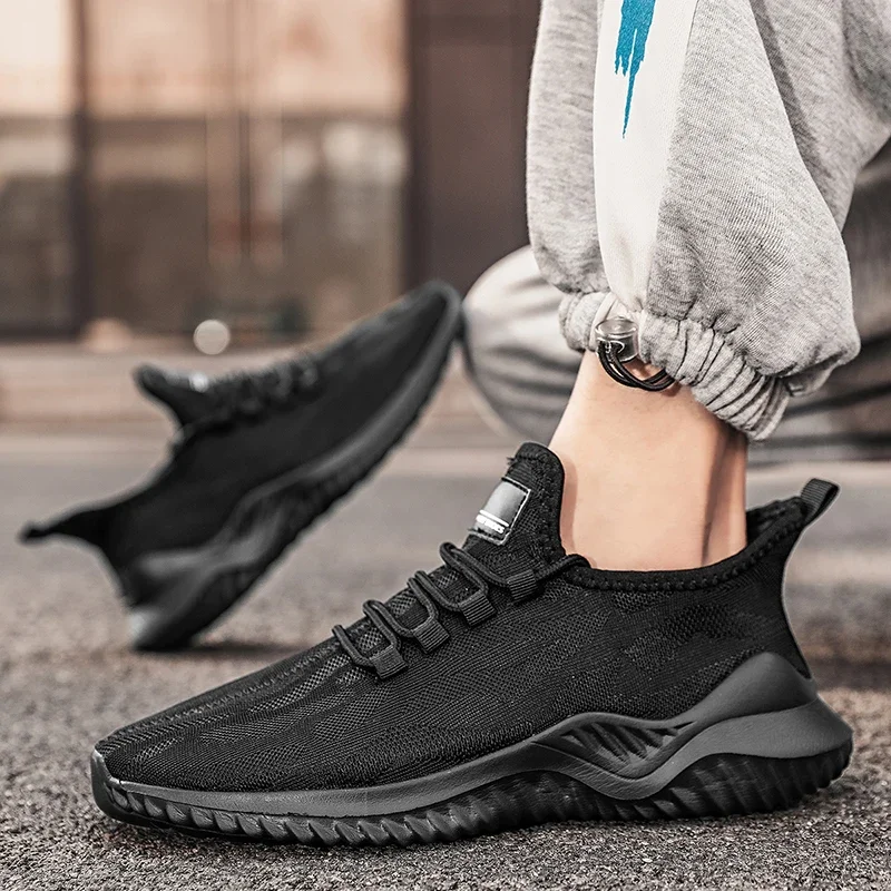 Scarpe Casual da uomo in rete Sneakers bianche traspiranti di alta qualità scarpe da uomo Tenis da passeggio nere leggere e stringate alla moda