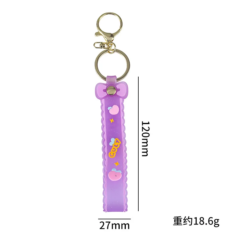 سلسلة مفاتيح من حبل جلدي على شكل فيونكة شفافة من السيليكون اللامع من Minso مع حقيبة كرتونية على شكل دمية زيتية وإكسسوارات هدايا