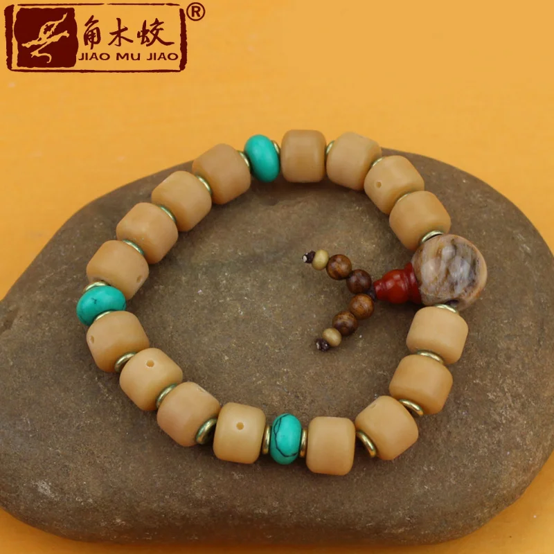 

Jiaomu Jiao Yellow Bodhi Root Barrel Bead Bracelet DIYUnique jewelry designs