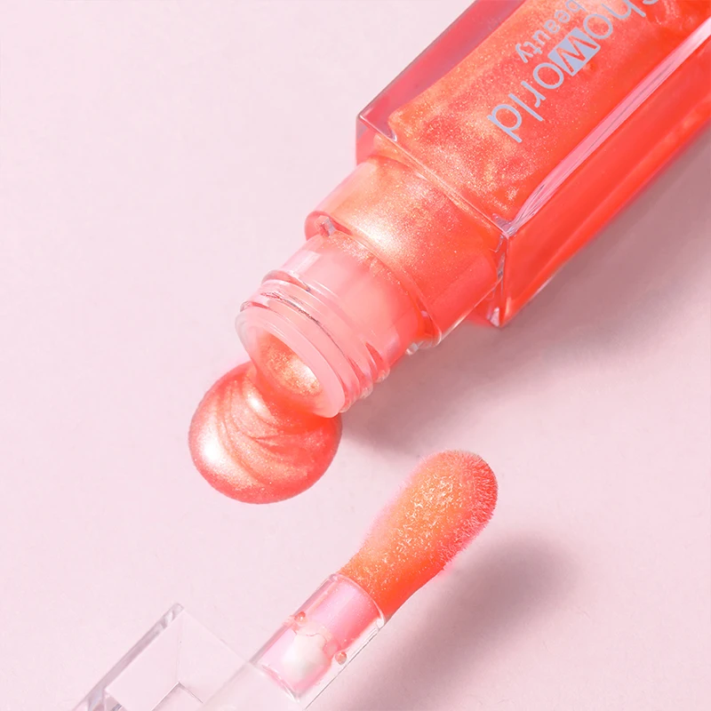 Orangerot feuchtigkeitsspendender Lipgloss, glänzender öliger Lipgloss, natürliches Lippenaufhellungsprodukt, zur Verschönerung der Lippen.