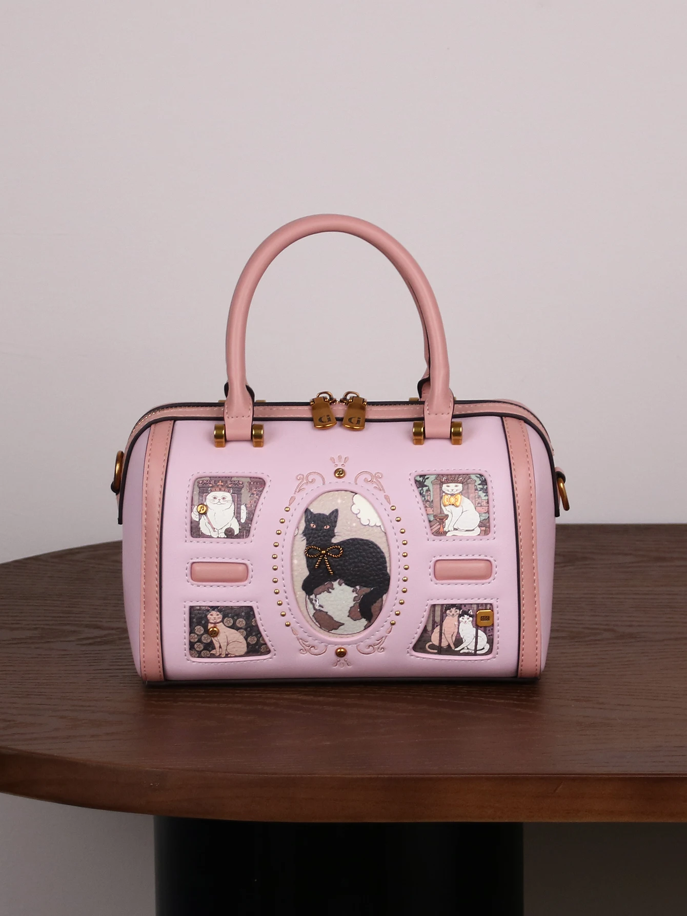 

2025 niche design fashion new high-quality handbag retro rivet frame cute cat Boston pillow bag commuter large capacity luxury s