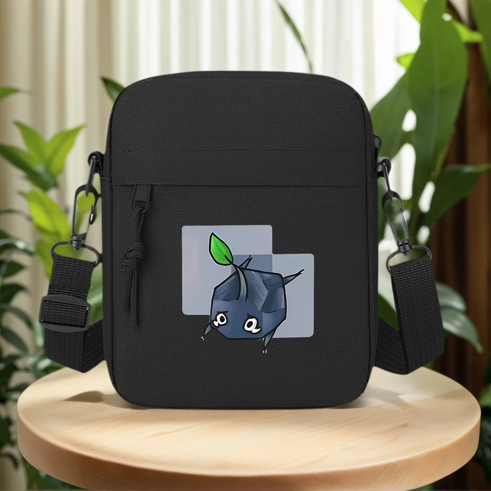 Cubic creature green leaf sad eyes Men Crossbody Bag Single Shoulder Women Cartoon Anime Film Printing Design Unisex