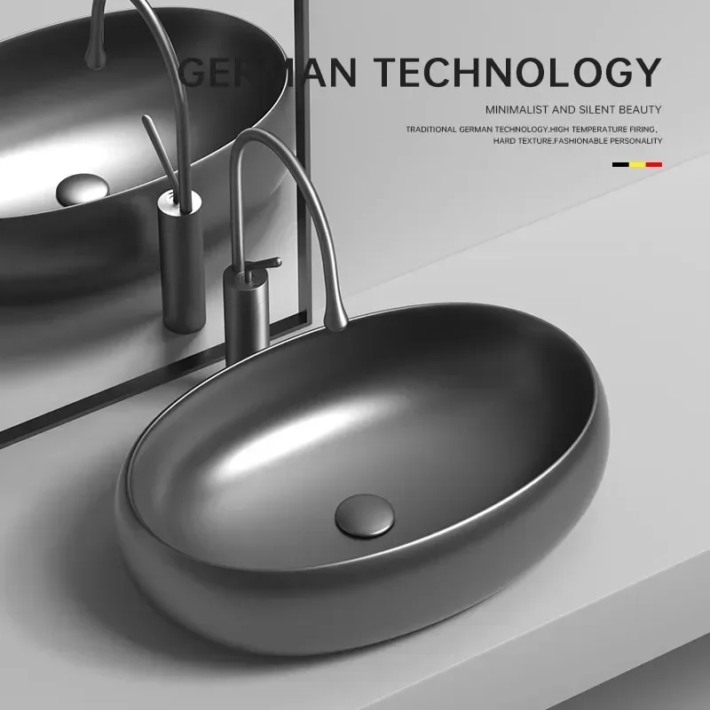 

Nordic gun gray oval countertop basin household bathroom ceramic wash basin balcony wash art basin