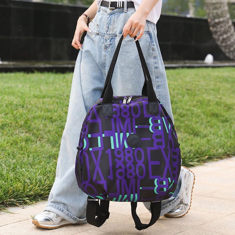 Mochila de viaje impermeable para mujer, bolso de hombro con estampado de letras, elegante, para viaje