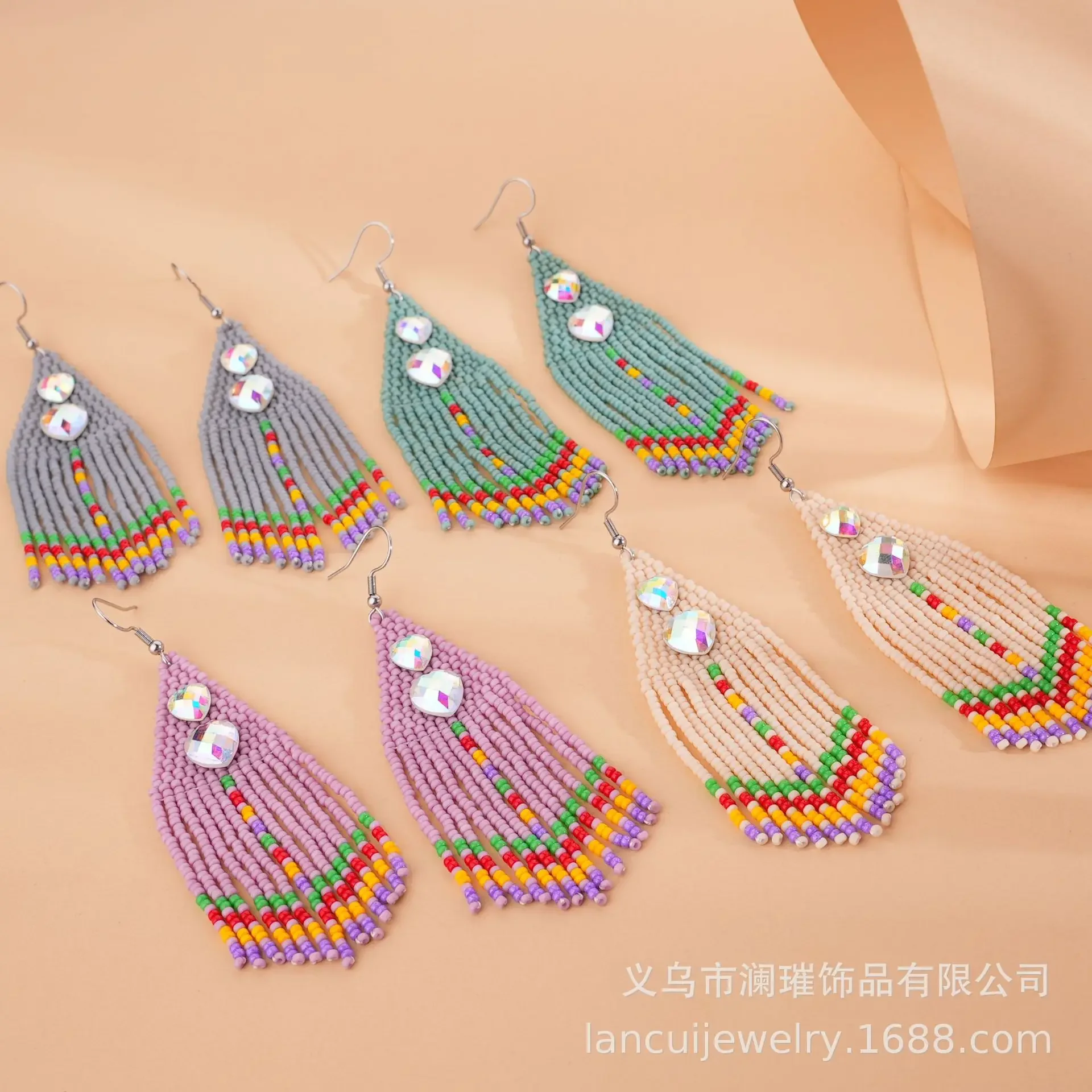 

Fringed earrings Hand woven Versatile fashion love Beading Simplicity Bohemia alloy ma'am Rice bead earrings