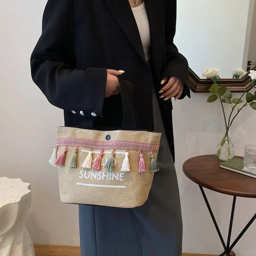 Bolso de mano de lona de gran capacidad, bolso de mano de lino tejido con letras y borlas, bolso de maquillaje, compras de estilo japonés