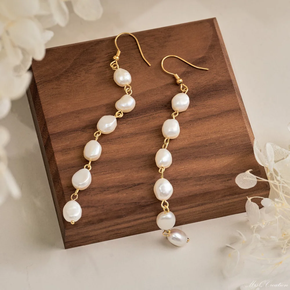 

Женские длинные серьги KKBEAD