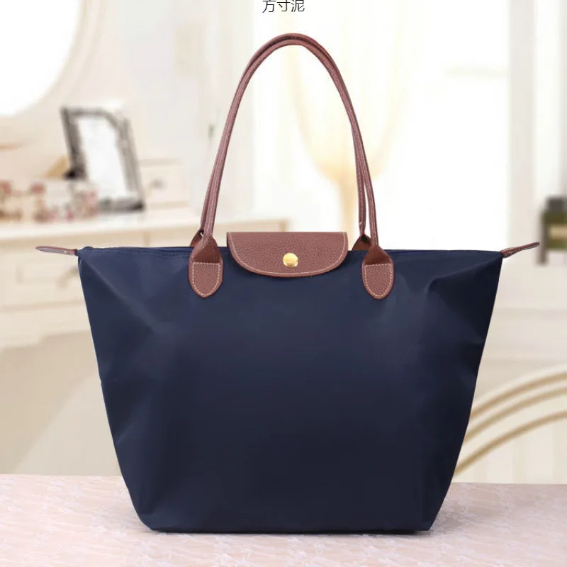 

Hot Sale! 2025 New Fashionable Women's Oxford Cloth Dumpling Bag - Large Capacity Nylon Shoulder Bag for Moms