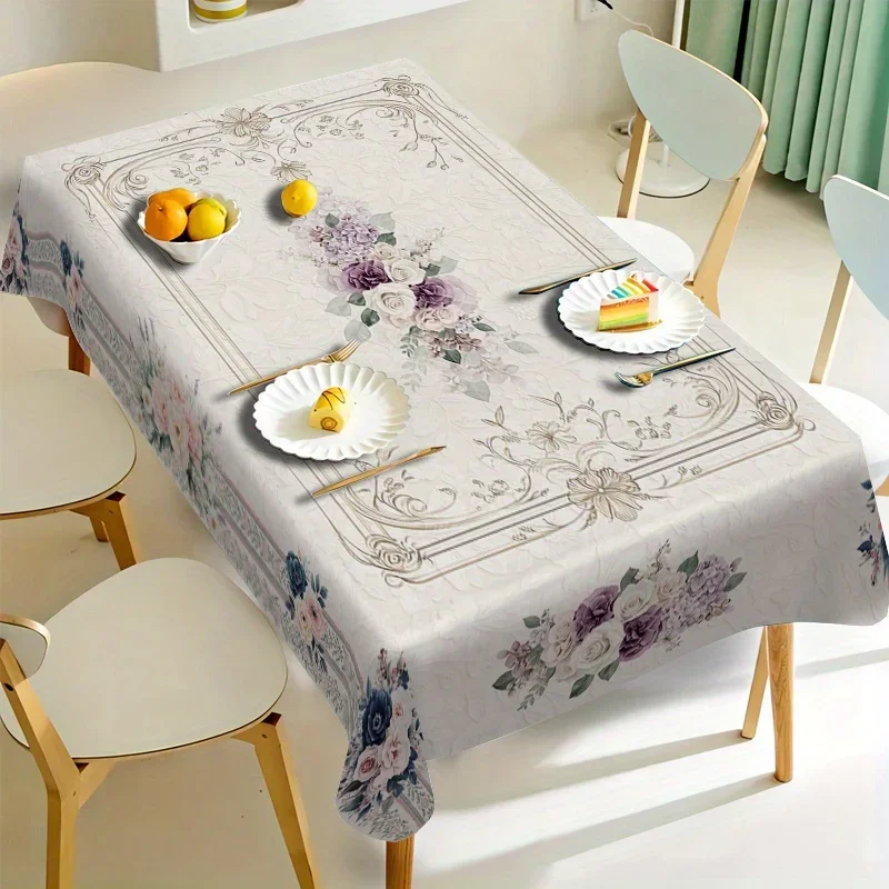 White and beige floral relief-printed tablecloth, with blue, pink and purple at the corners and in the center.